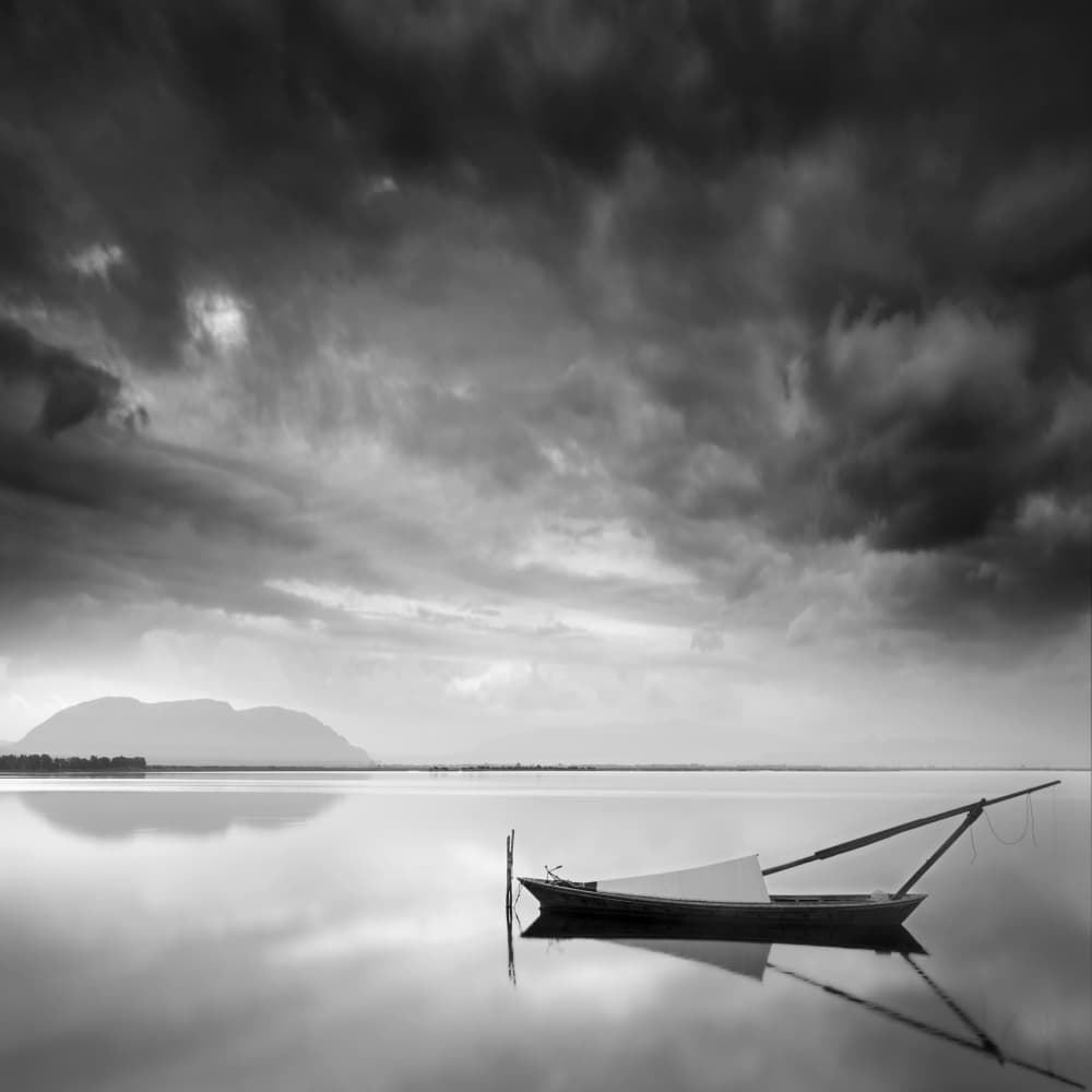 Quiet Boat Stormy Sky by George Digalakis — canvas wall art