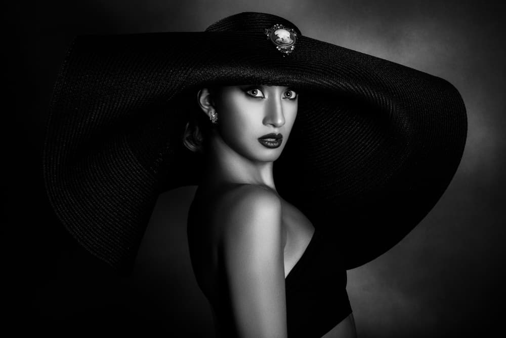 Dramatic Black Hat Portrait by Peppe Tambè — canvas wall art