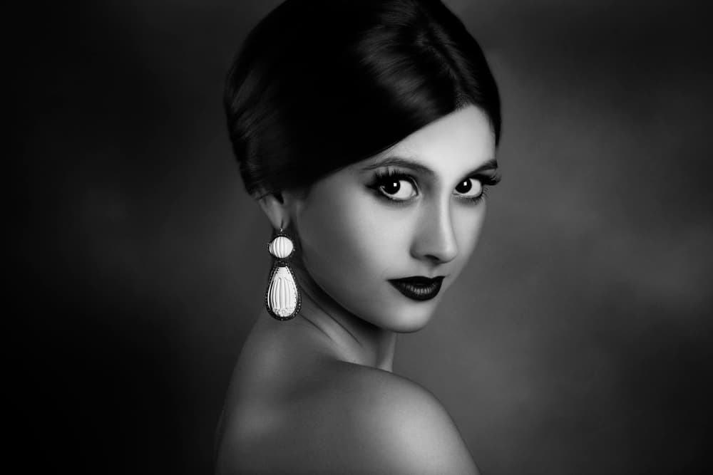 Elegant Woman's Gaze by Peppe Tambè — canvas wall art