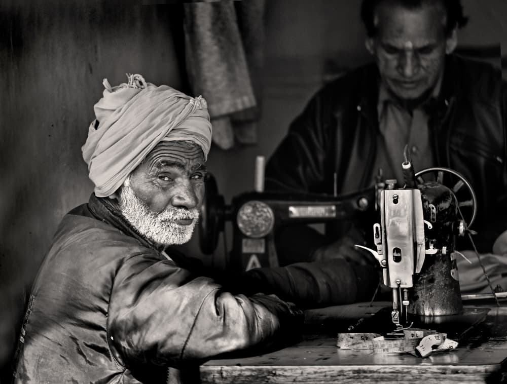 Skilled Tailor at Work by Lou Urlings — canvas wall art
