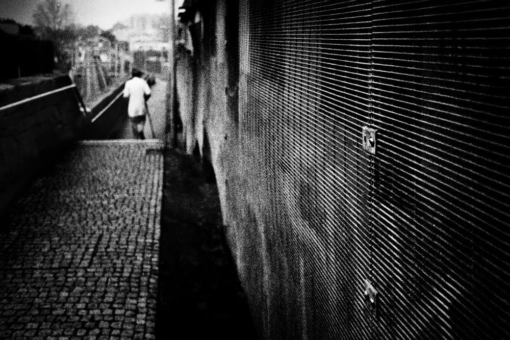 Man on Urban Path by Paulo Abrantes — canvas wall art