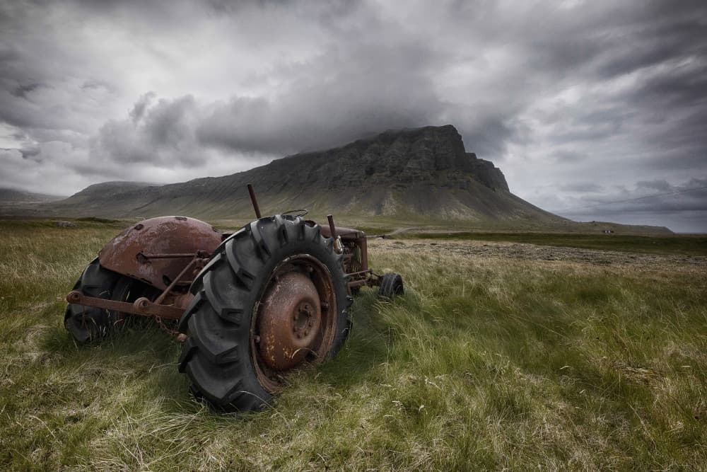 Rusty Tractor Mountainscape by Þorsteinn H. Ingibergsson — canvas wall art