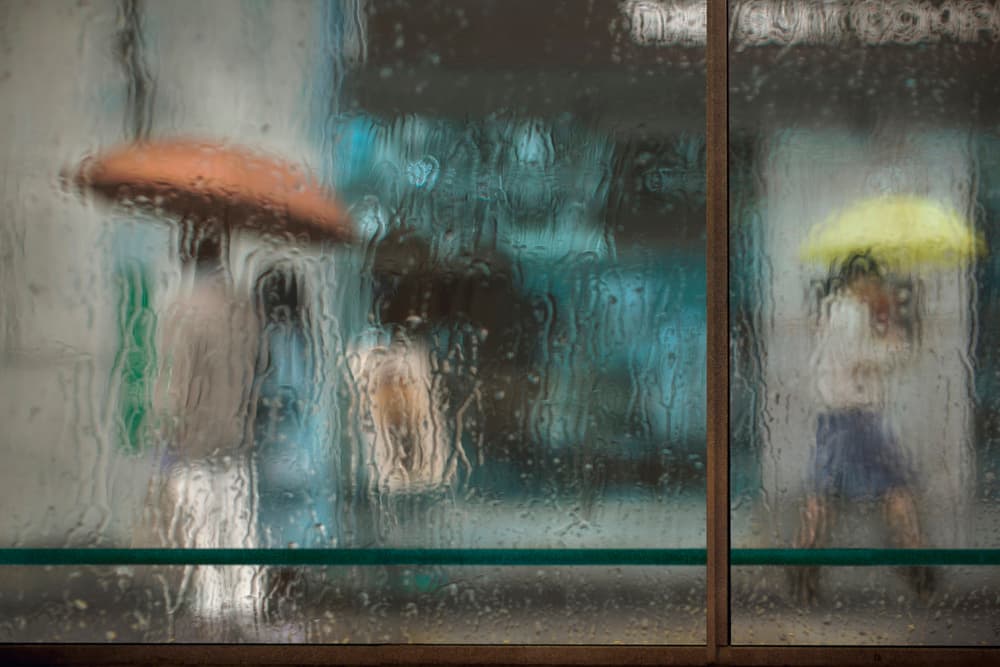 Street Through Rain by Ekkachai Khemkum — canvas wall art