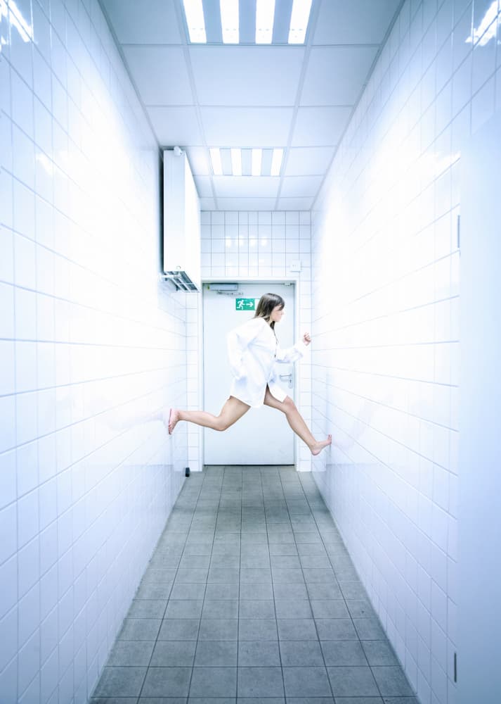 Floating Through Corridor by Michael Allmaier — canvas wall art