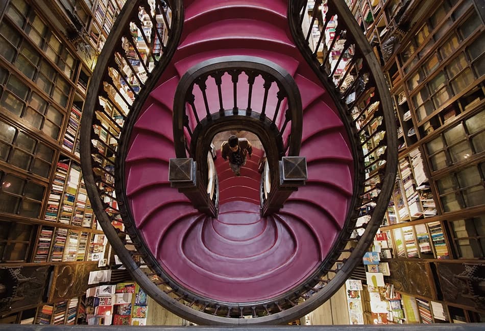 Winding Bookstore Staircase by Filipe P Neto — canvas wall art