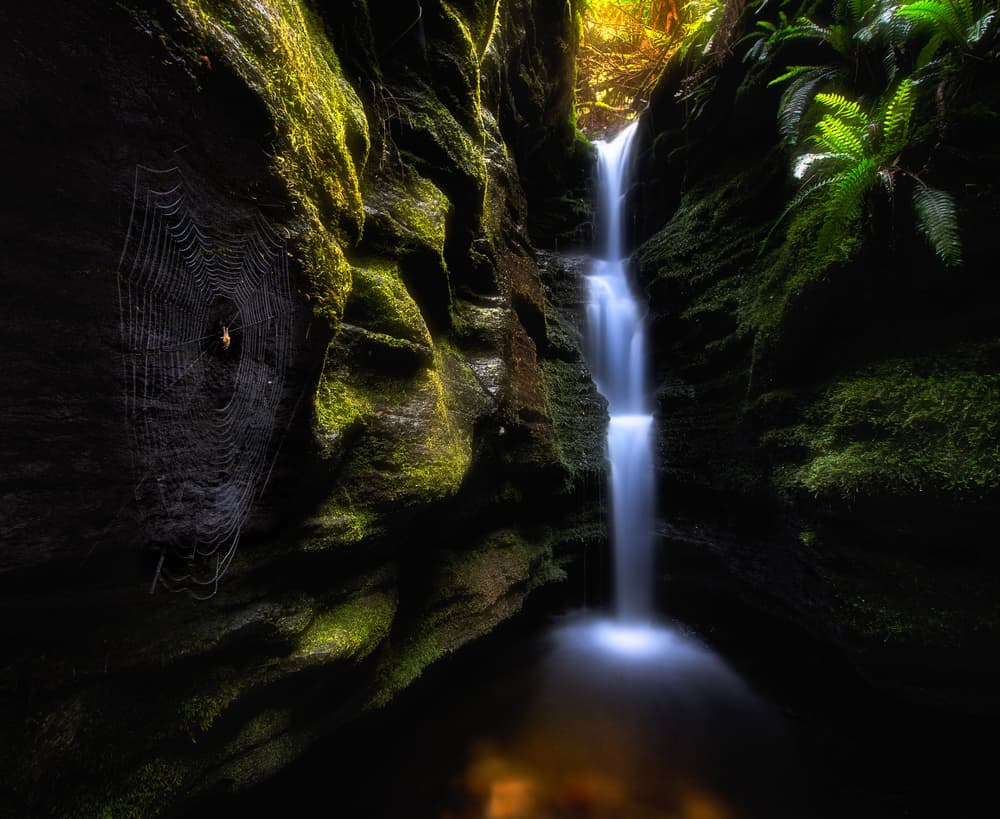 Hidden Canyon Waterfall by FEI SHI — canvas wall art