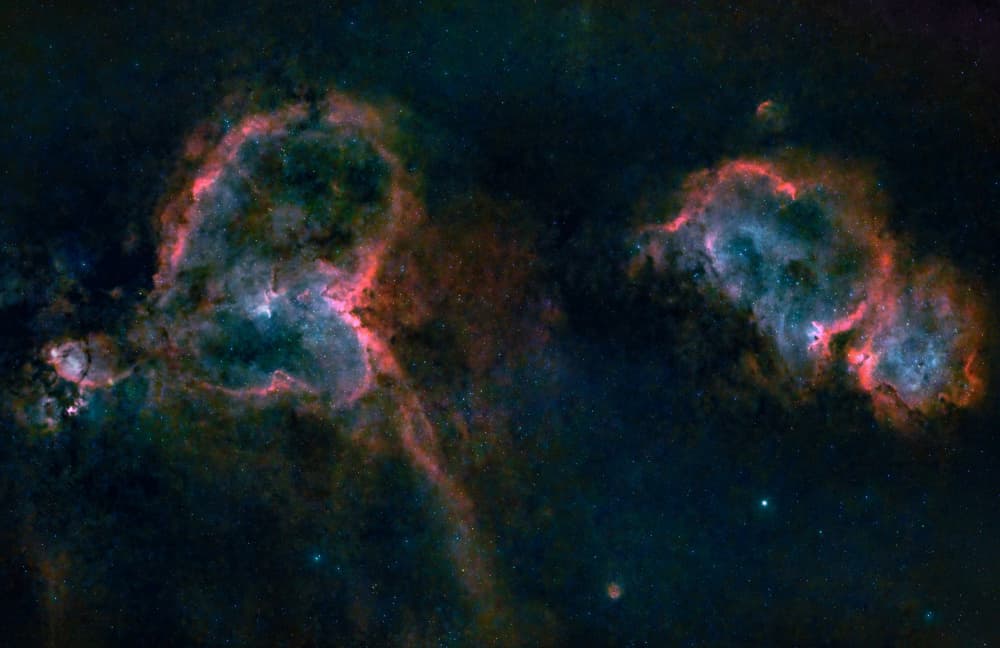Glowing Heart Nebulas by Bruce Li — canvas wall art
