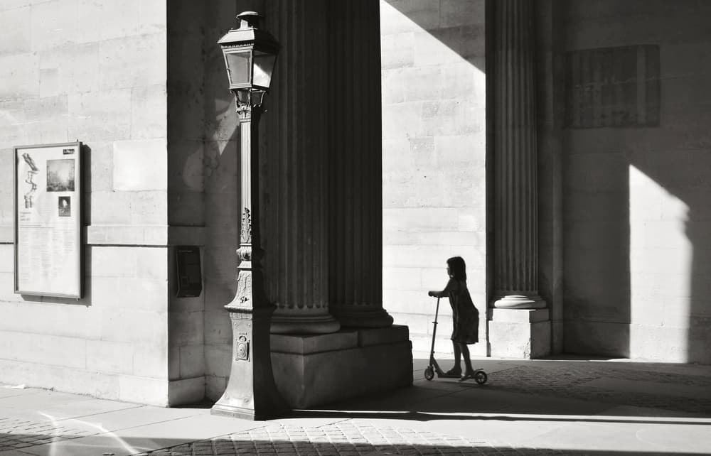 Girl on Scooter Silhouette by Vlad Eftenie — canvas wall art