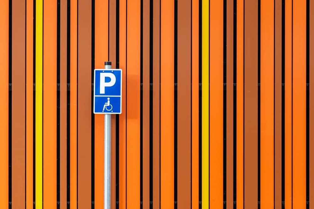 Orange Striped Parking Sign by Markus Auerbach — canvas wall art