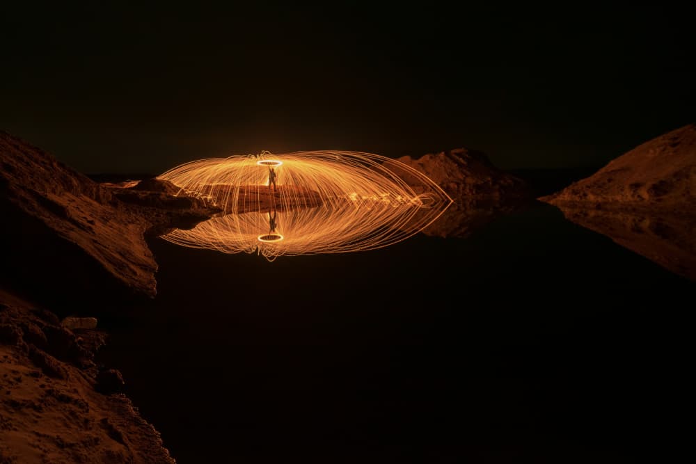 Golden Fire Water Reflection by Mrinal Nath — canvas wall art