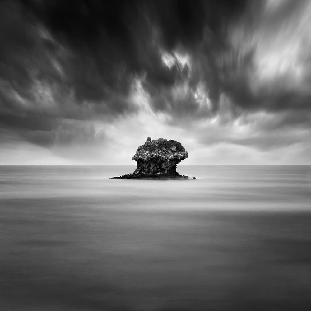 Solitary Ocean Rock by George Digalakis — canvas wall art