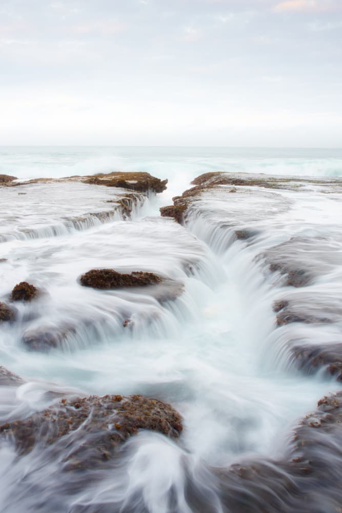 Misty Ocean Flow by Ihsan M — canvas wall art