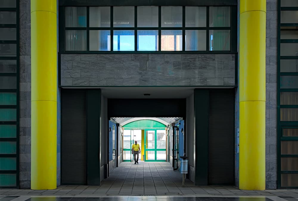 Man Under Yellow Pillars by Francesco Del Santo — canvas wall art
