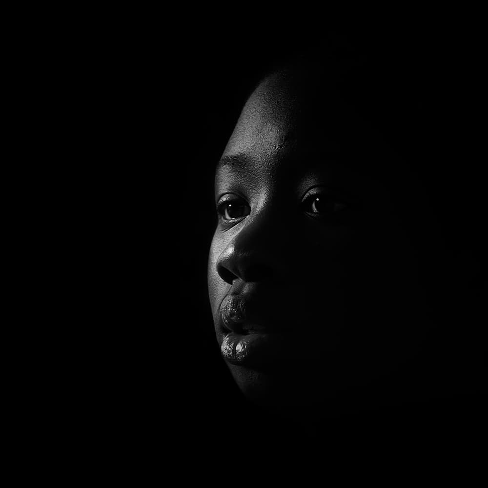 Thoughtful Shadow Portrait by Roberto Marini — canvas wall art