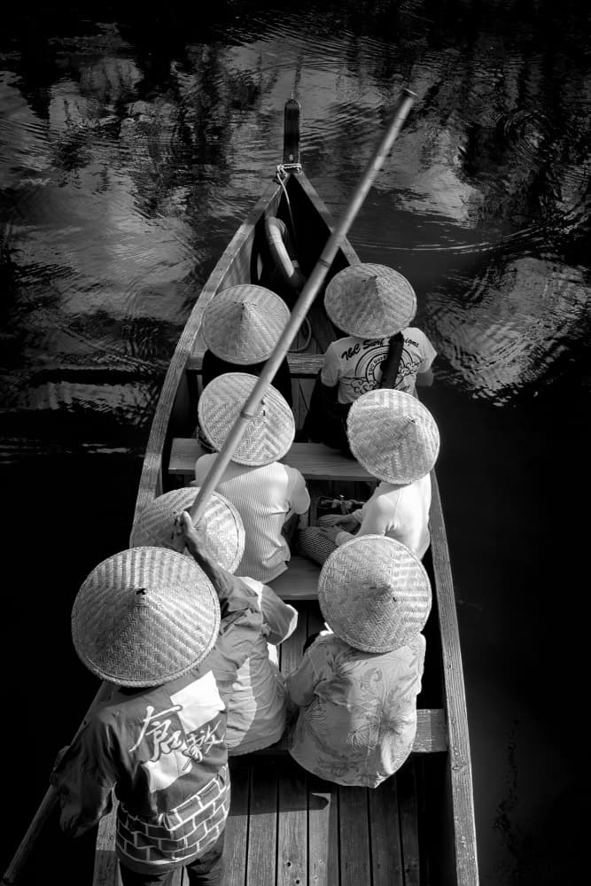 Paddlers in Conical Hats by Raffi Bashlian — canvas wall art