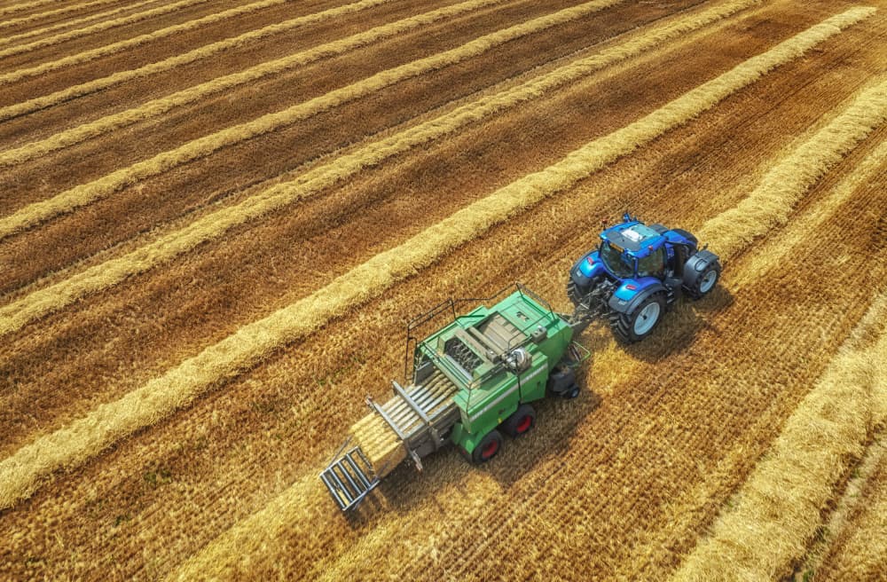 Tractor Baling Golden Field by Guy Krier — canvas wall art