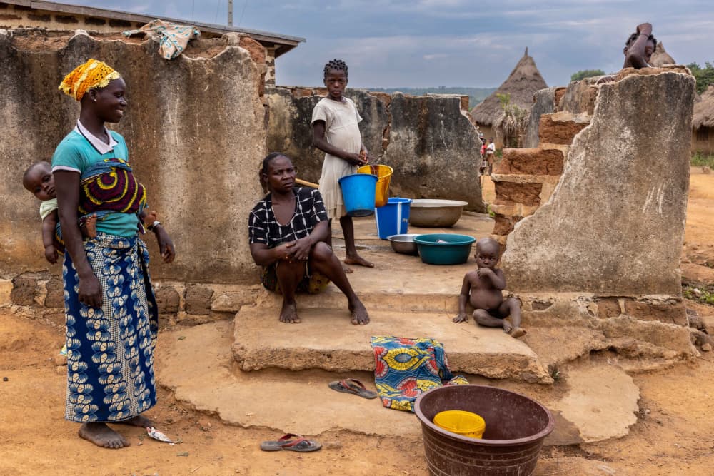 African Village Family by Ella Waldman — canvas wall art