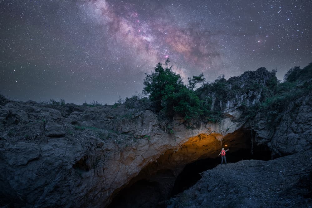 Milky Way Cave Explorer by Simoon — canvas wall art
