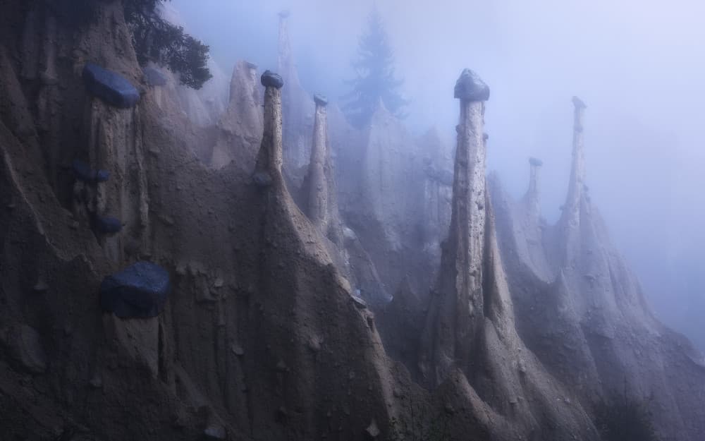 Eerie Mountain Pillars by Sabine Weise — canvas wall art