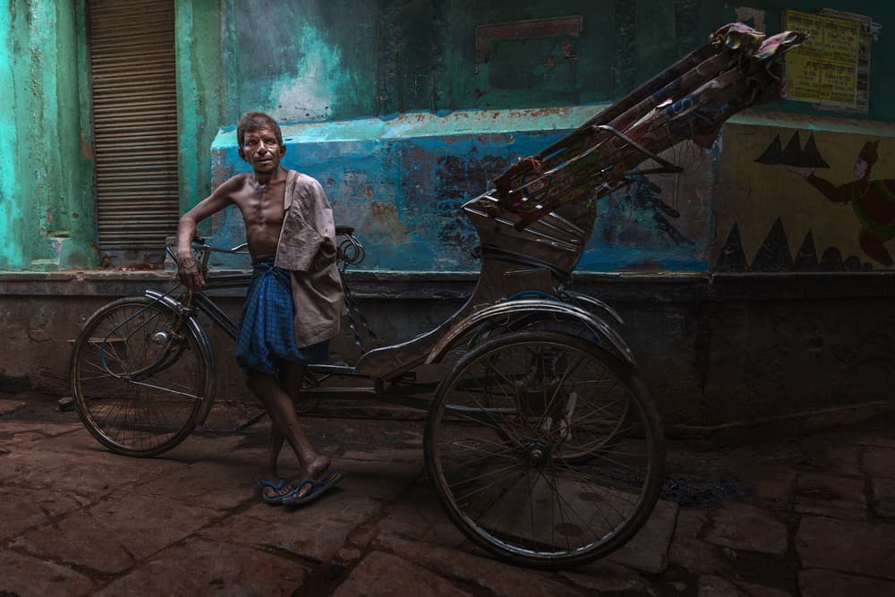 Indian Rickshaw Puller by Fadhel Almutaghawi — canvas wall art