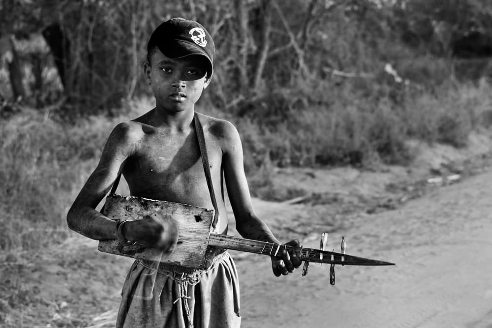 Desert Boy with Instrument by txules — canvas wall art