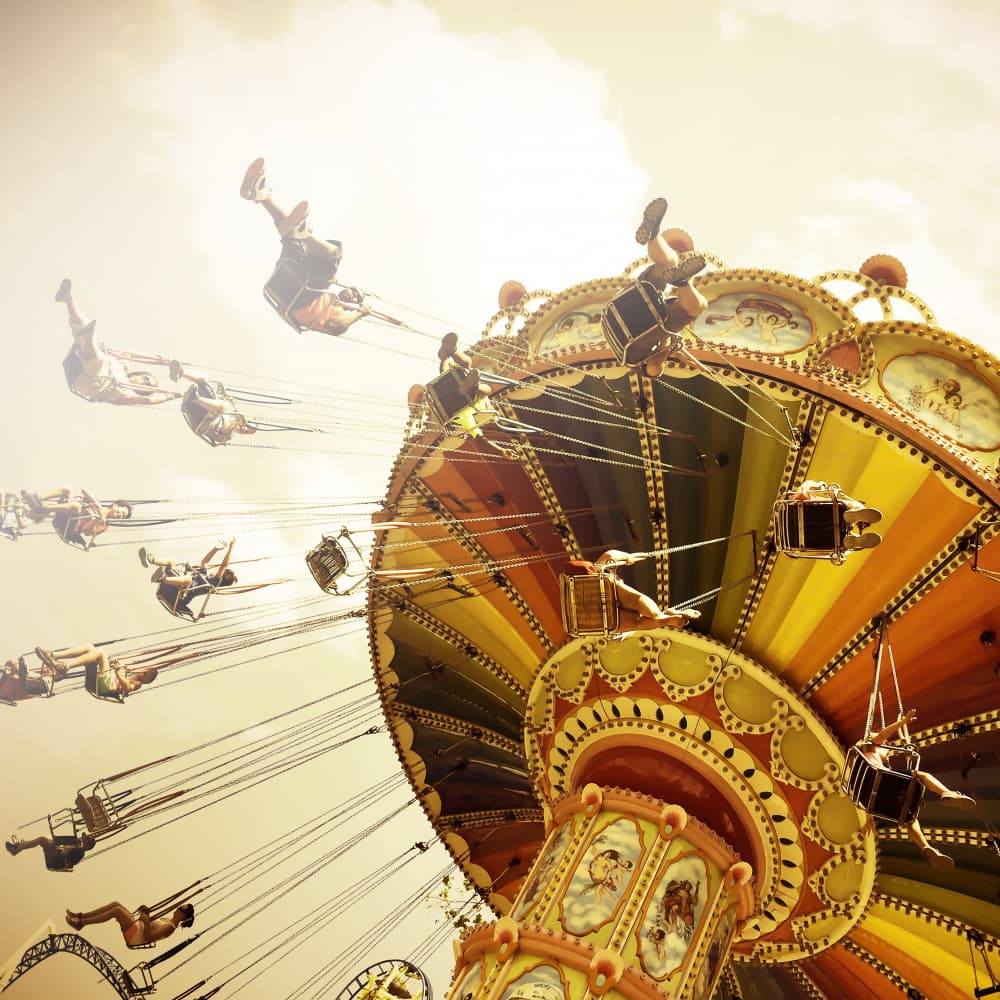 Golden Carnival Swings by Kapuschinsky — canvas wall art
