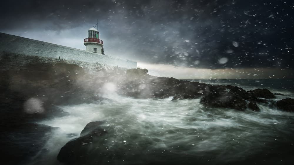 Lighthouse In Winter Storm by Marcin Krakowski — canvas wall art