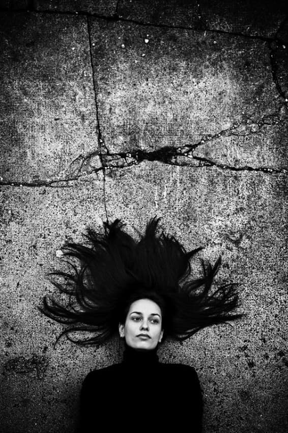 Pensive Woman On Concrete by Vedran Vidak — canvas wall art