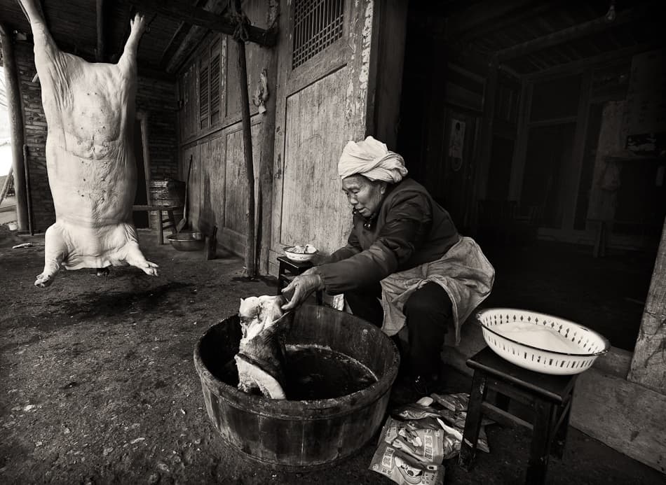 Traditional Village Butchering by Nicolas Marino — canvas wall art