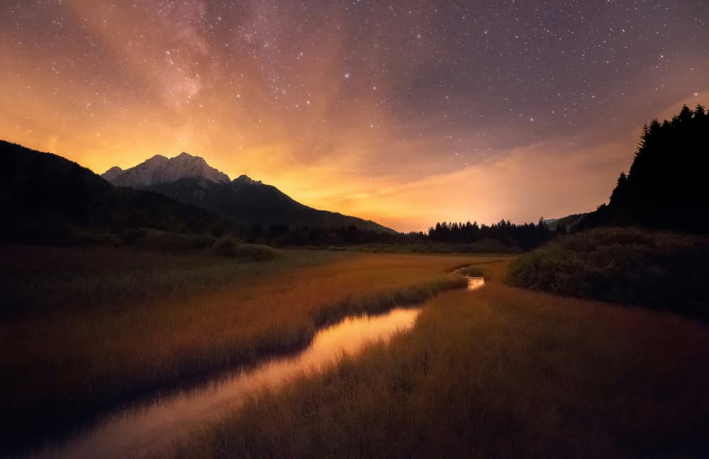 Starry Mountain River Glow by Ales Krivec — canvas wall art