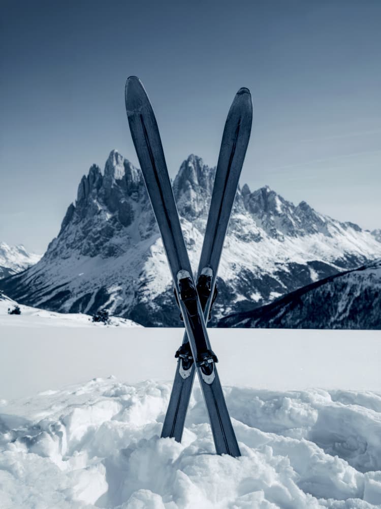 Skis In Snowy Mountains by Andreas Magnusson — canvas wall art