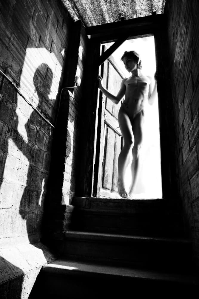 Figure In The Doorway by Olga Mest — canvas wall art