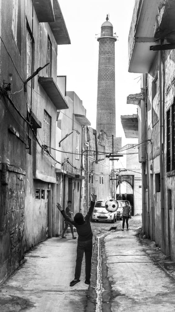 Street Soccer Minaret by Bashar Alsofey — canvas wall art