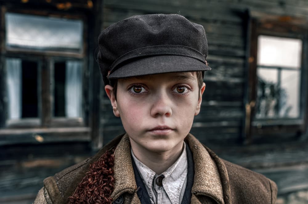 Solemn Young Boy by Waldemar Szmidt — canvas wall art