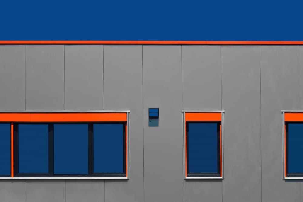 Modern Orange Blue Facade by Hans-Wolfgang Hawerkamp — canvas wall art
