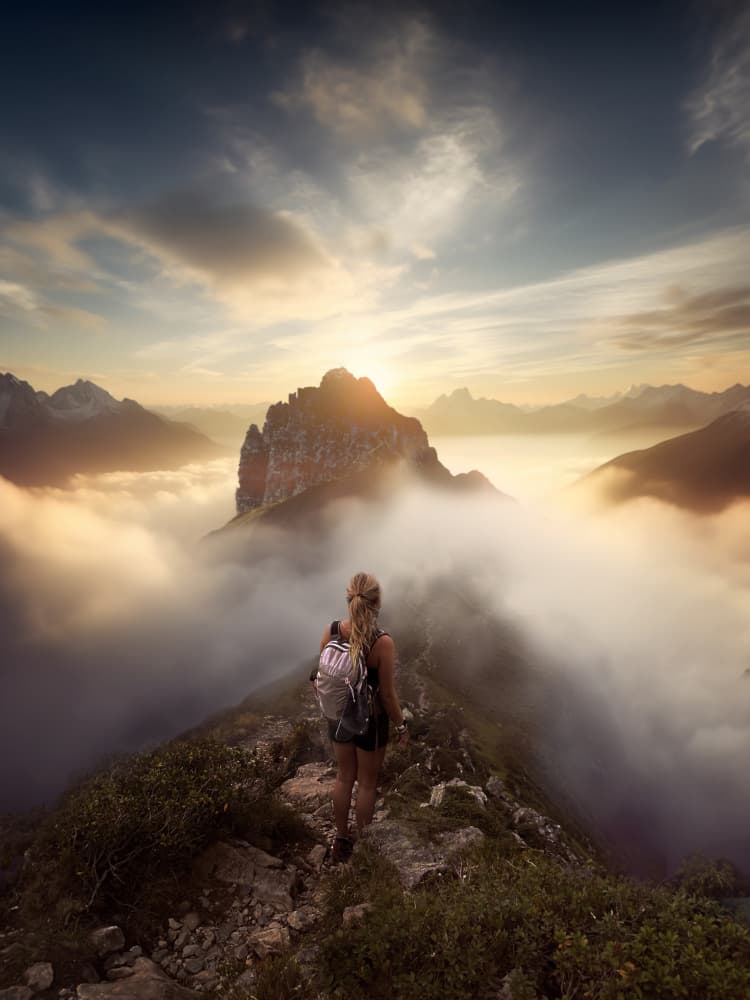 Hiker Above Misty Mountains by Marcel Egger — canvas wall art