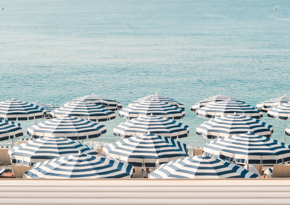 Blue Striped Beach Umbrellas by Talitha McQueen — canvas wall art