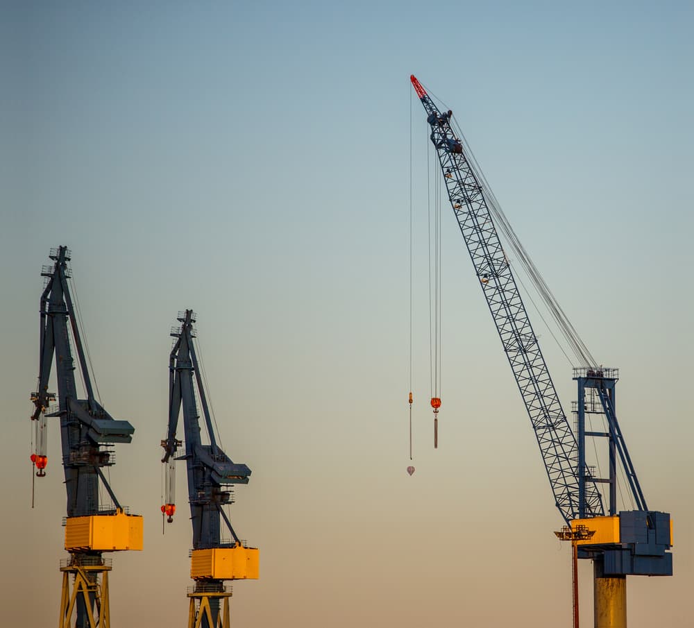 Harbor Cranes At Dusk by Sascha Block — canvas wall art