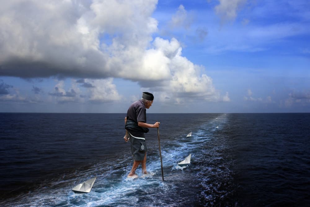 Elderly Man's Ocean Journey by Ivan Valentino — canvas wall art
