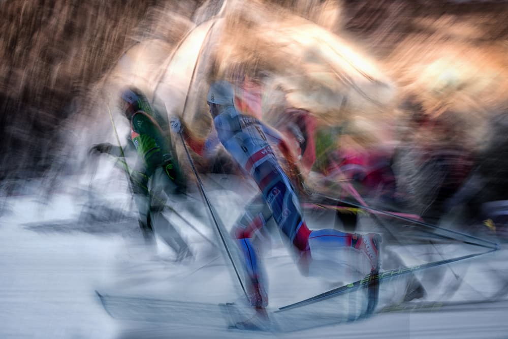 Skiers In Motion Blur by Milan Malovrh — canvas wall art