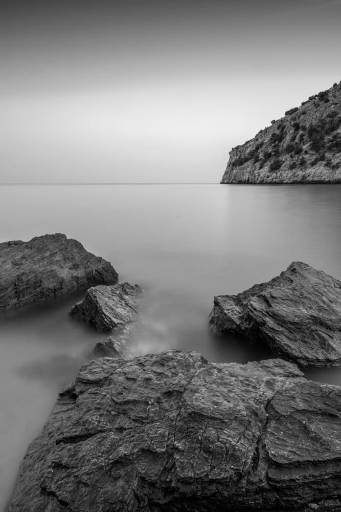 Tranquil Sea Rocks by Catalin Baican — canvas wall art