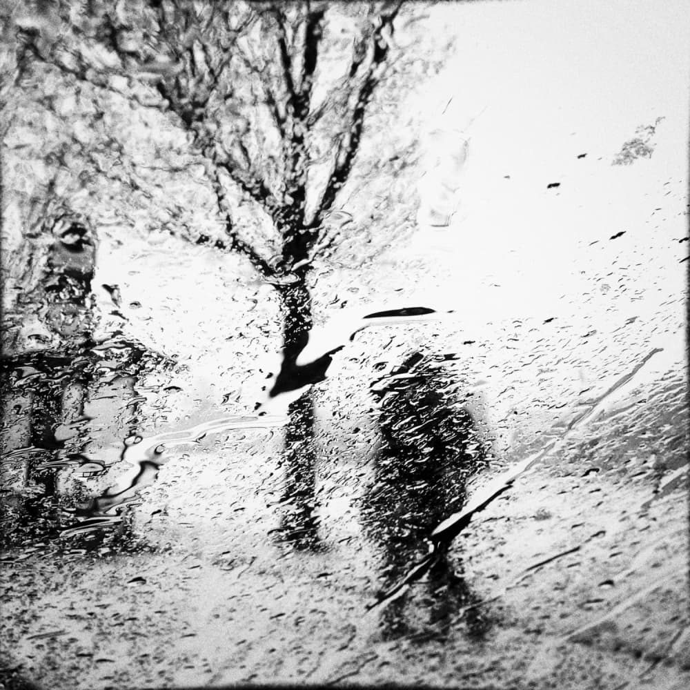 Rainy City Silhouette by Tommi — canvas wall art