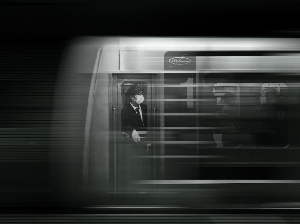Masked Conductor Train Motion by HISASHI ISHIKAWA — canvas wall art
