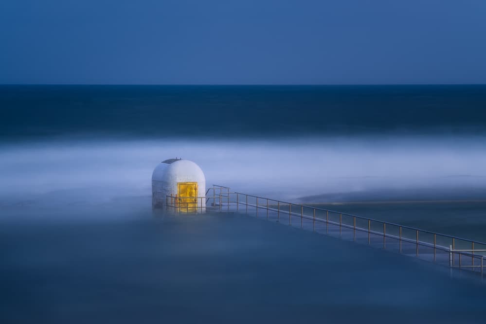 Misty Coastal Shelter by Jingshu Zhu — canvas wall art