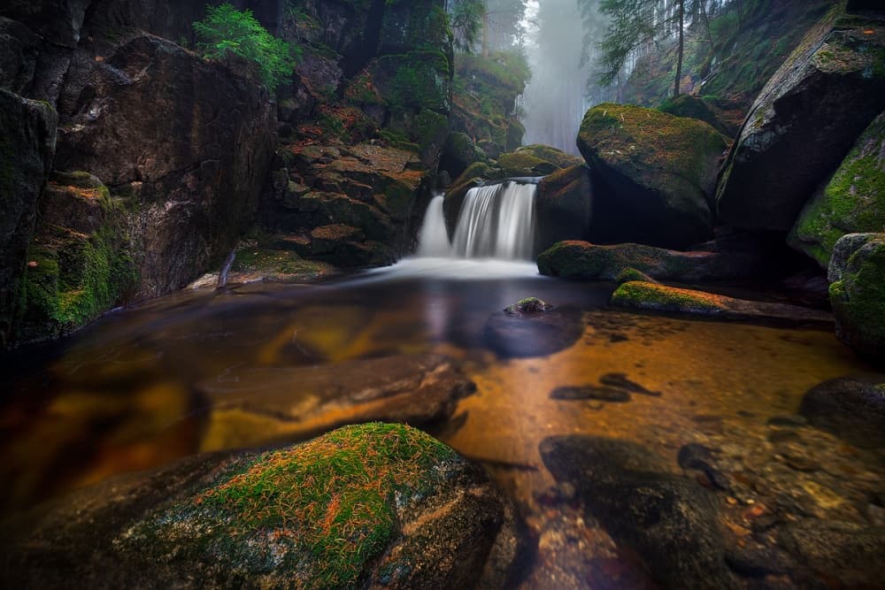 Misty Forest Waterfall by Lucjan Stoszko — canvas wall art