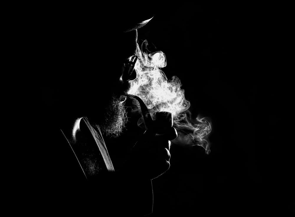 Contemplative Pipe Smoker by Paulo Medeiros — canvas wall art