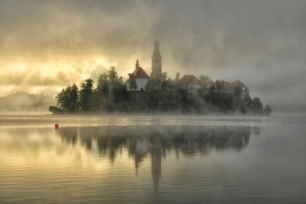 Misty Island Church Reflection by Bojan Kolman — canvas wall art