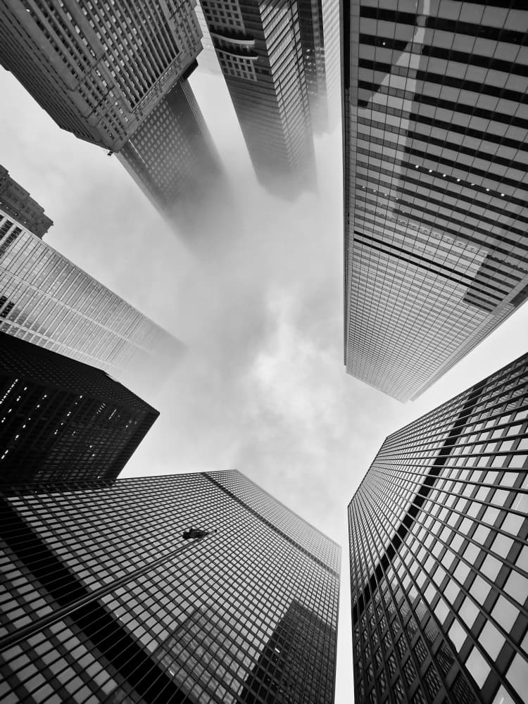 Skyscrapers Into Clouds by Jasmine Zhang — canvas wall art