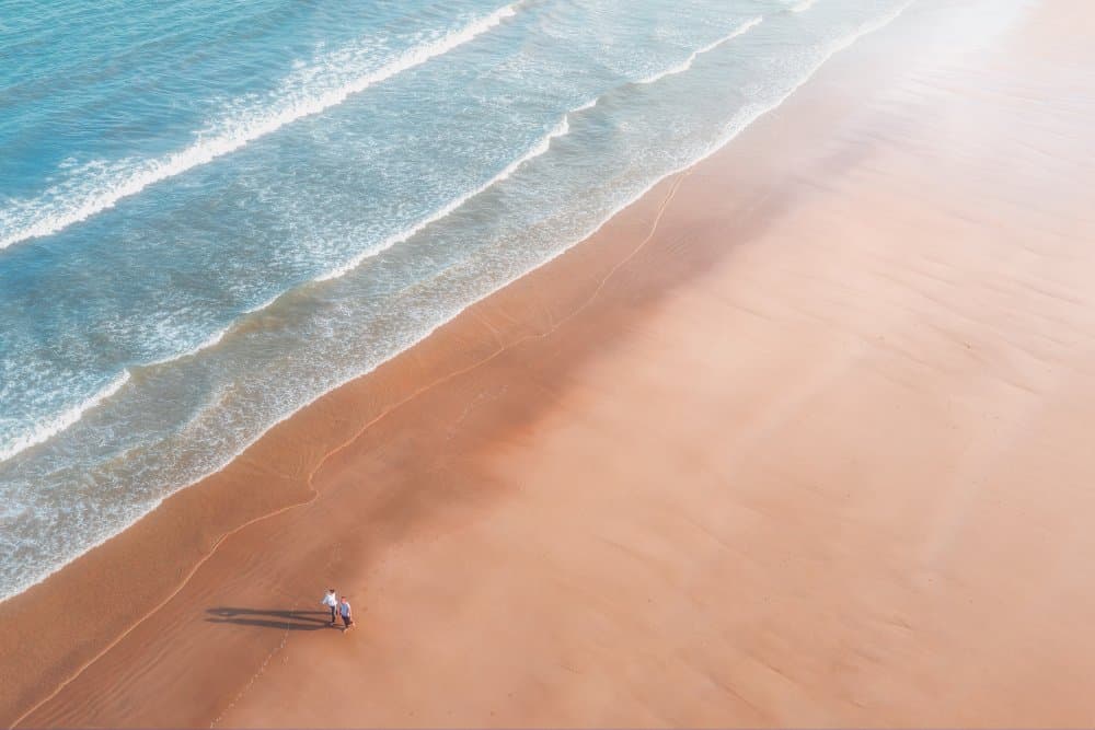 Serene Beach Stroll by Ashen — canvas wall art