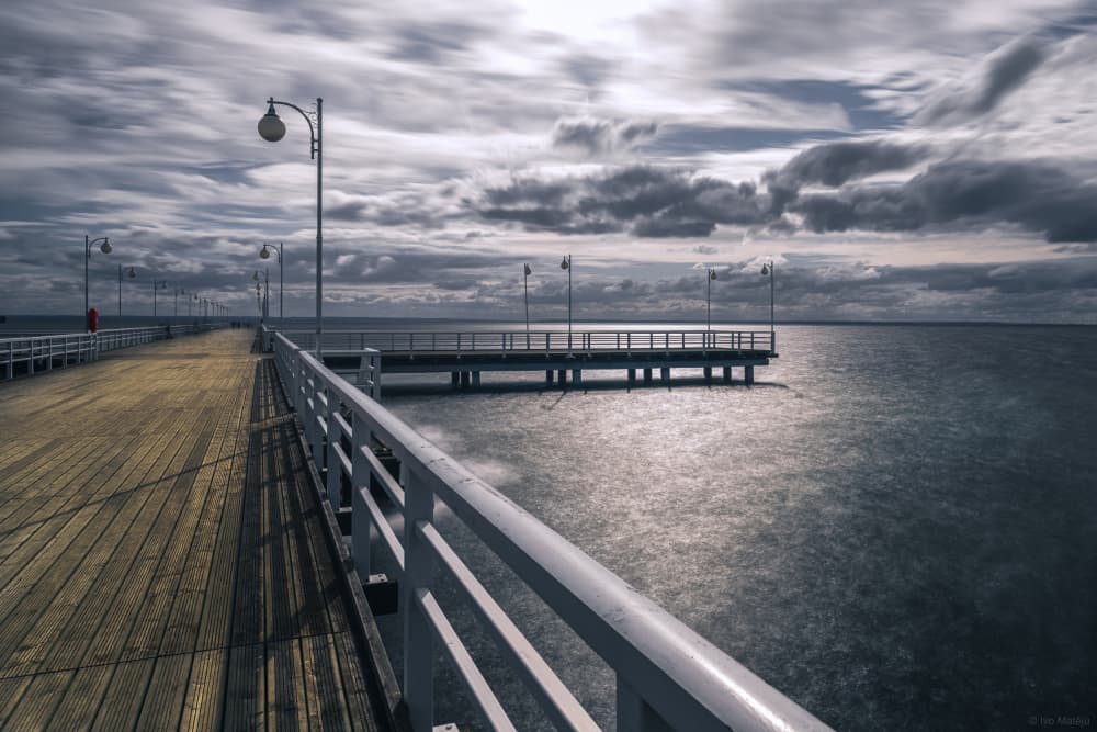 Moody Pier Over Ocean by Ivo Mateju — canvas wall art